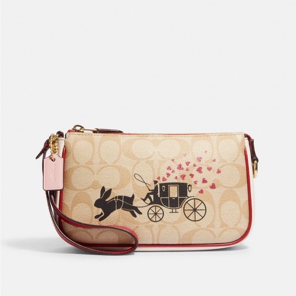 Coach Handbags - Coach 2023 Lunar New Year Nolita In Signature Canvas with dust bag NWT